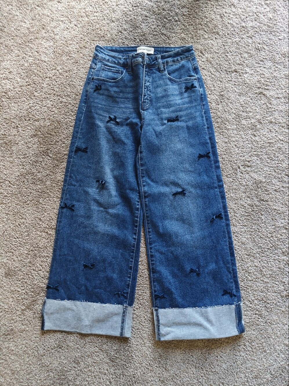 NWT Risen Bow Detail Flare Cuffed Distressed Bottom Blue Jeans Size 7 | 28